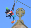 Mickey Mouse enjoys the zip-wire ride from the top of the tower